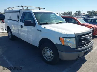 2014 Ford F-150 XL with VIN 1FTNF1CF5EKF62031, listed as a IAAI auction lot 41657632 with 216,689 mi miles. Bid and sale history available at carsss.com. Image 1.