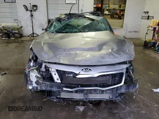 2013 Kia Optima EX с VIN 5XXGN4A70DG239393, выставлен на аукционе Copart как лот 41923615 с пробегом Не указан миль и Списание • Salvage title. История ставок и продаж доступна на DreamBid. Изображение 5.