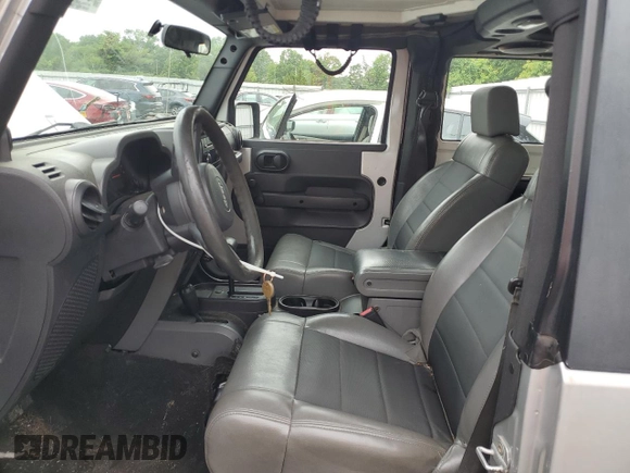 2008 Jeep Wrangler X z VIN 1J4FA24168L629174, wystawiony jako Copart lot #61199205 z przebiegiem 116 307 mil mil oraz Szkoda całkowita • Salvage title. Historia ofert i sprzedaży dostępna na DreamBid. Obrazek 7.