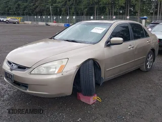 2004 Honda Accord EX with VIN 1HGCM66514A061236, listed as a IAAI auction lot 42565461 with 214,605 mi miles and . Bid and sale history available at DreamBid. Image 2.