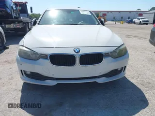 2014 BMW 3 Series 320i with VIN WBA3B1G53ENT00444, listed as a IAAI auction lot 42082984 with 94,401 mi miles. Bid and sale history available at carsss.com. Image 6.