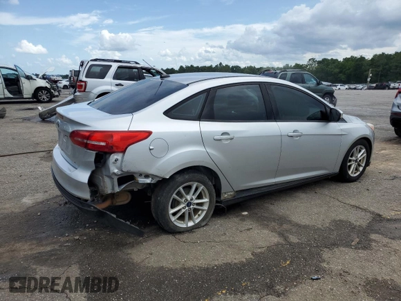 2017 Ford Focus SE with VIN 1FADP3F29HL242325, listed as a Copart auction lot 61153555 with 136,666 mi miles and Salvage title. Bid and sale history available at DreamBid. Image 3.