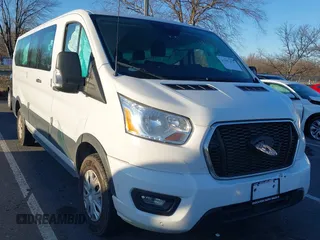 2021 Ford Transit Passenger XL with VIN 1FBAX2Y87MKA64167, listed as a IAAI auction lot 41087474 with 67,242 mi miles. Bid and sale history available at carsss.com. Image 1.