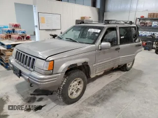 1997 Jeep Grand Cherokee Limited with VIN 1J4GZ78Y4VC589688, listed as a Copart auction lot 84673974 with 183,930 mi miles and Salvage Title. Bid and sale history available at carsss.com. Image 1.