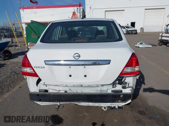 2010 Nissan Versa 1.8 S with VIN 3N1BC1AP8AL465537, listed as a IAAI auction lot 41762115 with 163,533 mi miles and . Bid and sale history available at carsss.com. Image 16.
