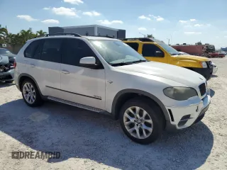 2011 BMW X5 35i with VIN 5UXZV4C54BL412770, listed as a Copart auction lot 53043825 with 148,612 mi miles and Clean Title. Bid and sale history available at carsss.com. Image 4.