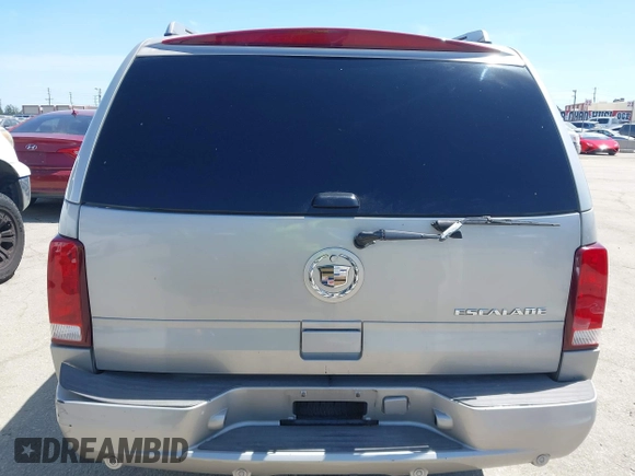 2005 Cadillac Escalade z VIN 1GYEC63N65R249827, wystawiony jako IAAI lot #42247650 z przebiegiem 254 052 mil mil oraz . Historia ofert i sprzedaży dostępna na DreamBid. Obrazek 17.