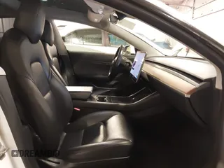 2018 Tesla Model 3 Long Range Battery with VIN 5YJ3E1EA8JF154738, listed as a IAAI auction lot 41013807 with 115,488 mi miles and . Bid and sale history available at DreamBid. Image 5.