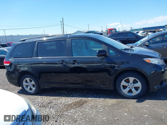 2014 Toyota Sienna LE AAS with VIN 5TDKK3DC4ES445998, listed as a IAAI auction lot 42093872 with 220,943 mi miles. Bid and sale history available at carsss.com. Image 13.