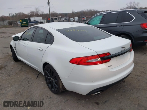 2014 Jaguar XF SC with VIN SAJWA0EX0E8U09381, listed as a IAAI auction lot 41783386 with 27,730 mi miles and . Bid and sale history available at DreamBid. Image 3.