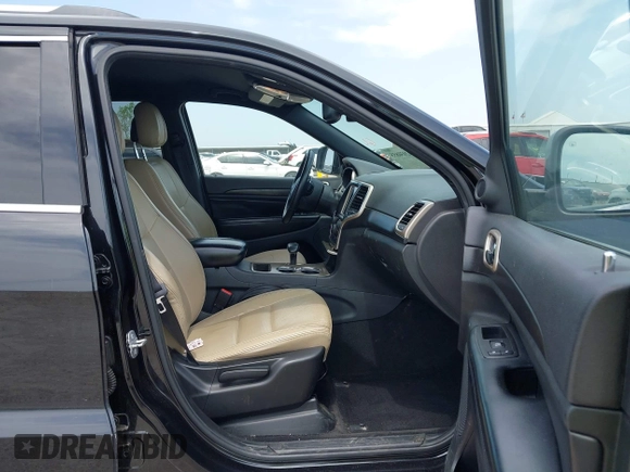 2014 Jeep Grand Cherokee Laredo with VIN 1C4RJFAG8EC440119, listed as a IAAI auction lot 42030855 with 179,392 mi miles and . Bid and sale history available at DreamBid. Image 5.