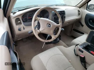 2001 Mazda B-Series Truck DS z VIN 4F4YR16U31TM01851, wystawiony jako Copart lot #57491815 z przebiegiem 113 145 mil mil oraz Szkoda całkowita • Salvage title. Historia ofert i sprzedaży dostępna na DreamBid. Obrazek 8.
