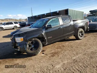 2021 GMC Canyon 4WD AT4 w/Cloth with VIN 1GTG6FEN9M1254293, listed as a Copart auction lot 87163874 with 33,645 mi miles and Salvage Title. Bid and sale history available at carsss.com. Image 1.