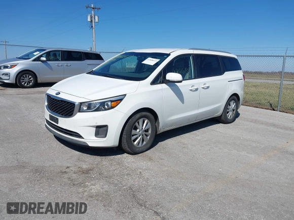 2017 Kia Sedona LX with VIN KNDMB5C18H6310158, listed as a IAAI auction lot 41808613 with 169,383 mi miles. Bid and sale history available at carsss.com. Image 2.