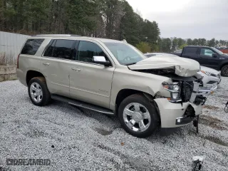 2017 Chevrolet Tahoe Premier with VIN 1GNSCCKC6HR143798, listed as a Copart auction lot 48562895 with 97,270 mi miles and Salvage Title. Bid and sale history available at carsss.com. Image 4.