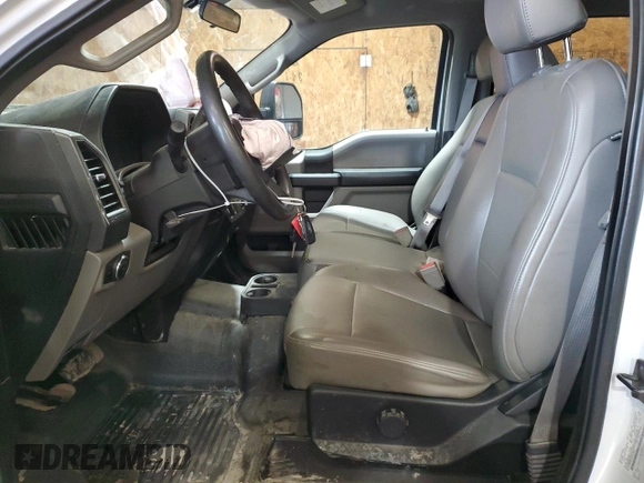 2018 Ford F-350 XL with VIN 1FT8W3BT3JEC37855, listed as a Copart auction lot 63740775 with 128,675 mi miles and Salvage title. Bid and sale history available at DreamBid. Image 7.