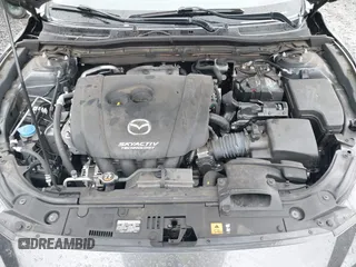 2016 Mazda 3 S Grand Touring z VIN JM1BM1N37G1351062, wystawiony jako IAAI lot #41573775 z przebiegiem 68 634 mil mil oraz . Historia ofert i sprzedaży dostępna na DreamBid. Obrazek 10.