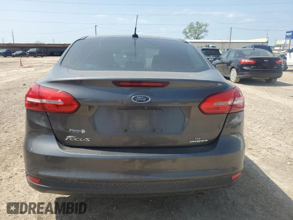 2016 Ford Focus SE with VIN 1FADP3F28GL267599, listed as a Copart auction lot 50965695 with 140,950 mi miles and Clean Title. Bid and sale history available at carsss.com. Image 6.