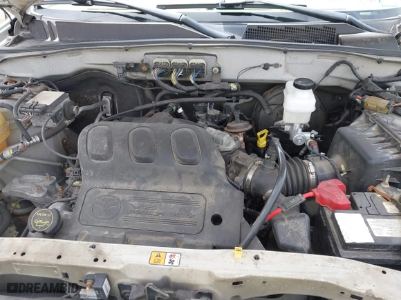 2008 Mazda Tribute Touring with VIN 4F2CZ961X8KM28763, listed as a IAAI auction lot 42048490 with 158,361 mi miles. Bid and sale history available at carsss.com. Image 10.