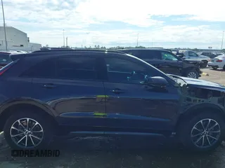 2024 Cadillac XT4 FWD Sport with VIN 1GYFZER40RF226384, listed as a IAAI auction lot 42220804 with 8,743 mi miles and . Bid and sale history available at DreamBid. Image 14.