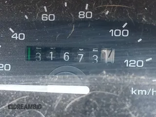 1992 Ford Tempo z VIN 1FAPP36U6NK188935, wystawiony jako IAAI lot #42133598 z przebiegiem 31 673 mil mil oraz . Historia ofert i sprzedaży dostępna na DreamBid. Obrazek 7.