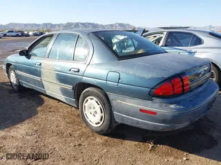 1995 Chevrolet Lumina with VIN 2G1WL52M6S9296674, listed as a IAAI auction lot 41830589 with 105,473 mi miles. Bid and sale history available at carsss.com. Image 2.