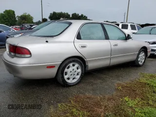 1993 Mazda 626 z VIN 1YVGE22B9P5208685, wystawiony jako Copart lot #73931064 z przebiegiem 91 446 mil mil oraz Nie do naprawy. Historia ofert i sprzedaży dostępna na DreamBid. Obrazek 3.