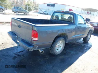 2001 Dodge Dakota with VIN 1B7FL26X91S342103, listed as a IAAI auction lot 41277465 with 157,993 mi miles. Bid and sale history available at carsss.com. Image 4.