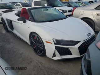 2020 Audi R8 Spyder performance z VIN WUA4BCFX3L7901606, wystawiony jako Copart lot #75199024 z przebiegiem Nie podano mil oraz Nie do naprawy. Historia ofert i sprzedaży dostępna na DreamBid. Obrazek 4.