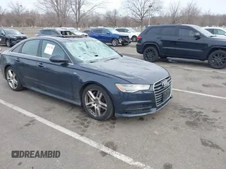 2017 Audi A6 Premium z VIN WAUF8AFCXHN079201, wystawiony jako IAAI lot #41717258 z przebiegiem 96 448 mil mil oraz . Historia ofert i sprzedaży dostępna na DreamBid. Obrazek 1.