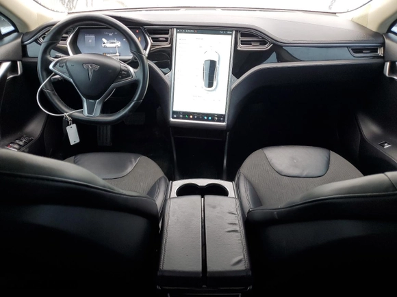 2013 Tesla Model S with VIN 5YJSA1CG3DFP16662, listed as a Copart auction lot 83674474 with 105,013 mi miles and Salvage Title. Bid and sale history available at carsss.com. Image 8.
