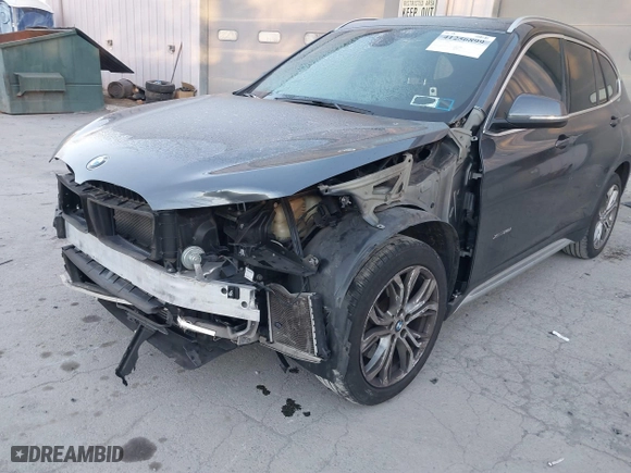 2017 BMW X1 xDrive28i with VIN WBXHT3C33H5F87591, listed as a IAAI auction lot 41256899 with 69,362 mi miles. Bid and sale history available at carsss.com. Image 6.