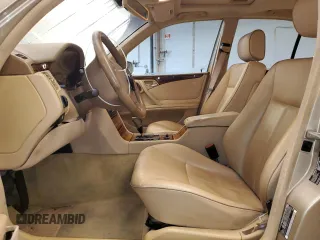 2002 Mercedes-Benz E-Class with VIN WDBJF65J12B485293, listed as a Copart auction lot 77561984 with 140,708 mi miles and Salvage Title. Bid and sale history available at carsss.com. Image 7.