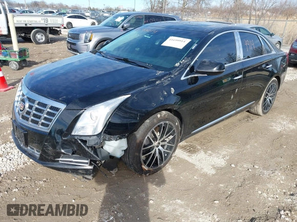 2015 Cadillac XTS Luxury z VIN 2G61N5S35F9155543, wystawiony jako IAAI lot #41699914 z przebiegiem 120 700 mil mil oraz . Historia ofert i sprzedaży dostępna na DreamBid. Obrazek 19.