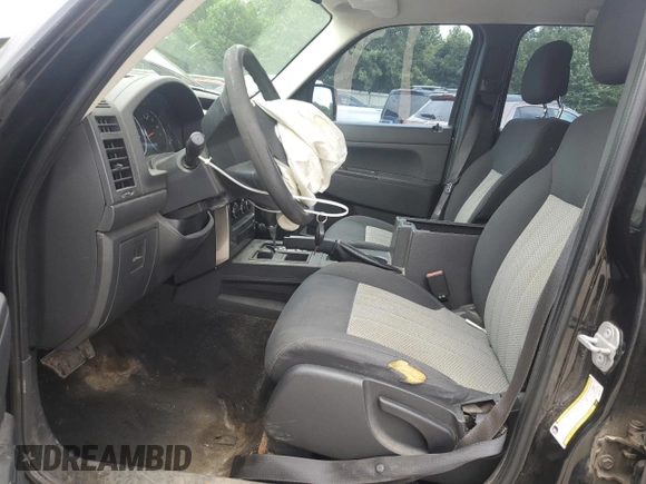 2010 Jeep Liberty Sport with VIN 1J4PN2GK8AW100147, listed as a Copart auction lot 63013305 with 161,400 mi miles and Salvage title. Bid and sale history available at DreamBid. Image 7.