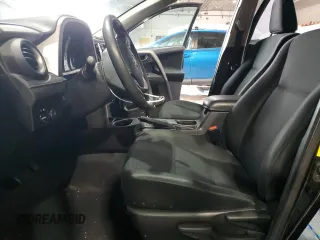 2017 Toyota RAV4 LE with VIN 2T3BFREV7HW601557, listed as a Copart auction lot 46050215 with 128,757 mi miles and Salvage Title. Bid and sale history available at DreamBid. Image 7.