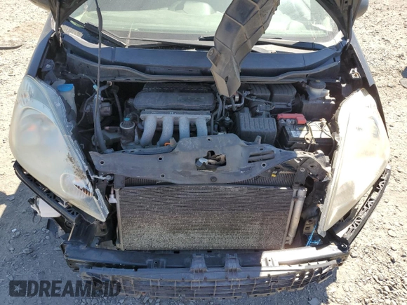 2009 Honda Fit Sport с VIN JHMGE88489S043605, выставлен на аукционе Copart как лот 60164185 с пробегом 179 941 миль миль и Списание • Salvage title. История ставок и продаж доступна на DreamBid. Изображение 11.