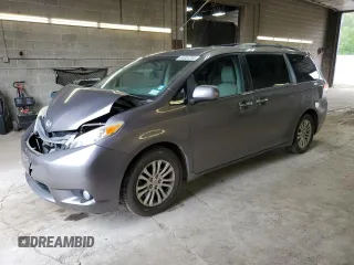 2012 Toyota Sienna XLE AAS z VIN 5TDYK3DC3CS198285, wystawiony jako Copart lot #64004755 z przebiegiem 144 607 mil mil oraz Szkoda całkowita • Salvage title. Historia ofert i sprzedaży dostępna na DreamBid. Obrazek 1.