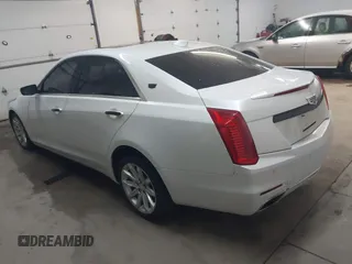2015 Cadillac CTS Luxury AWD with VIN 1G6AX5SX5F0117267, listed as a IAAI auction lot 41762217 with 79,930 mi miles and . Bid and sale history available at DreamBid. Image 3.
