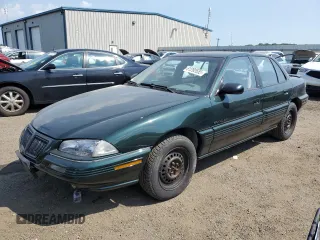 1995 Pontiac Grand Am with VIN 1G2NE55M3SC707664, listed as a Copart auction lot 61292655 with 62,031 mi miles and Clean title. Bid and sale history available at DreamBid. Image 1.