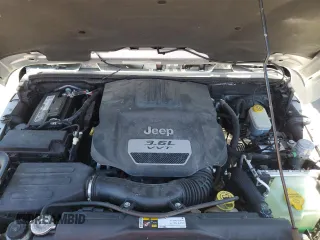 2012 Jeep Wrangler Unlimited Call of Duty MW3 with VIN 1C4BJWFG9CL199551, listed as a Copart auction lot 57097555 with 43,651 mi miles and Salvage title. Bid and sale history available at DreamBid. Image 12.