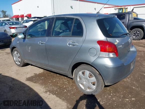 2010 Toyota Yaris with VIN JTDKT4K38A5285260, listed as a IAAI auction lot 41476373 with 104,358 mi miles. Bid and sale history available at carsss.com. Image 3.