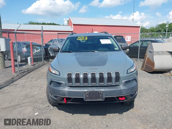 2014 Jeep Cherokee Trailhawk z VIN 1C4PJMBS4EW236950, wystawiony jako IAAI lot #42636128 z przebiegiem 170 491 mil mil oraz . Historia ofert i sprzedaży dostępna na DreamBid. Obrazek 13.