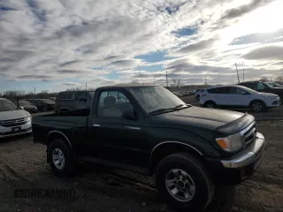 1999 Toyota Tacoma with VIN 4TAPM62N6XZ417283, listed as a Copart auction lot 84322844 with 74,233 mi miles and Clean Title. Bid and sale history available at DreamBid. Image 4.