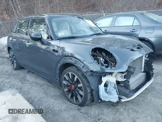 2016 MINI Cooper Hardtop 4 Door S with VIN WMWXU3C56G2B63682, listed as a IAAI auction lot 41244676 with 110,902 mi miles. Bid and sale history available at carsss.com. Image 1.