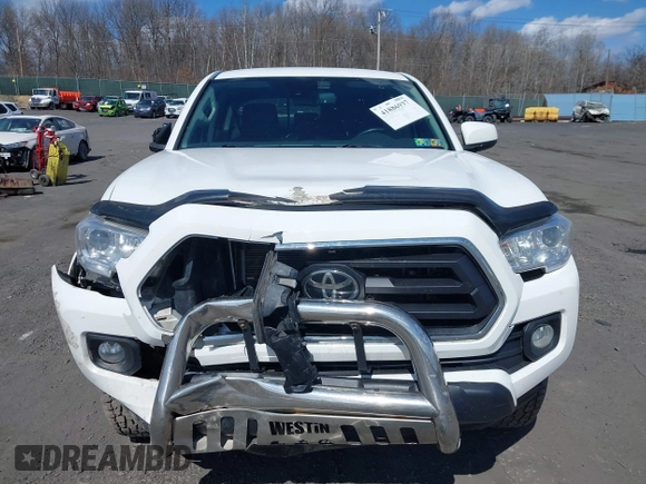 2020 Toyota Tacoma SR5 with VIN 3TMCZ5AN5LM339977, listed as a IAAI auction lot 41886937 with 94,986 mi miles and . Bid and sale history available at DreamBid. Image 6.