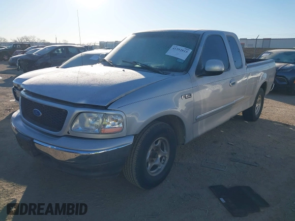 1999 Ford F-150 with VIN 1FTZX1729XKA58767, listed as a IAAI auction lot 41392815 with 342,029 mi miles and . Bid and sale history available at DreamBid. Image 2.
