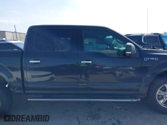 2015 Ford F-150 XLT with VIN 1FTEW1EF4FKD15422, listed as a IAAI auction lot 41593431 with 112,102 mi miles. Bid and sale history available at carsss.com. Image 13.