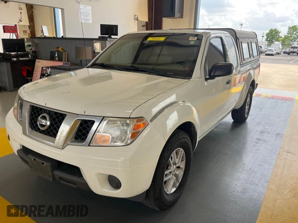 2017 Nissan Frontier SV with VIN 1N6AD0CUXHN734244, listed as a IAAI auction lot 42621115 with 128,130 mi miles and . Bid and sale history available at DreamBid. Image 9.