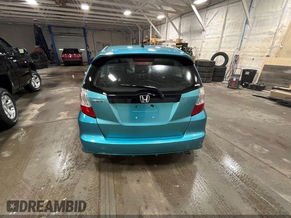 2013 Honda Fit Sport with VIN JHMGE8H58DC044846, listed as a IAAI auction lot 42201605 with 198,546 mi miles. Bid and sale history available at carsss.com. Image 13.
